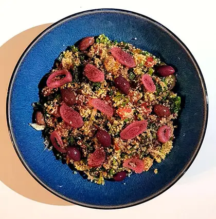 Tabbouleh on a blue bowl